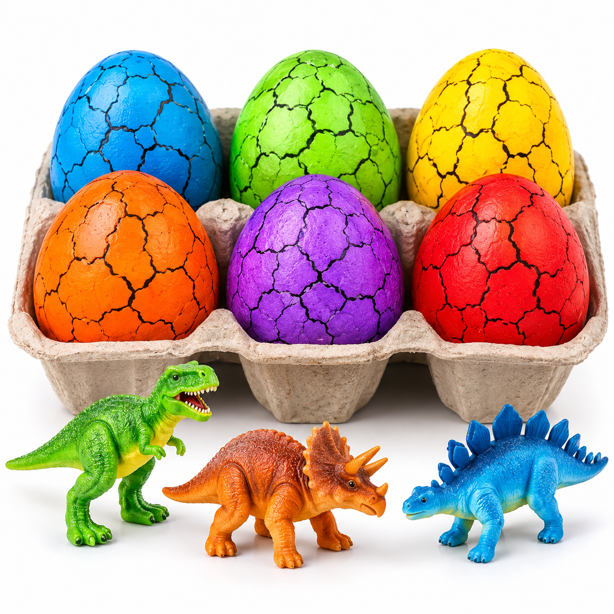 Colourful dinosaur eggs and toy dinosaurs